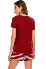 Casual graphic top with round neck and striped shorts set for a relaxed look